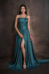 Pleated Gown with Dramatic Shoulder Cape